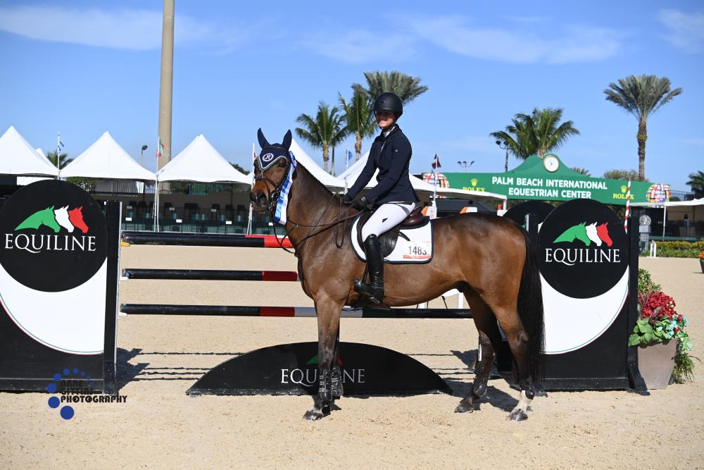 Rachel McMullen and Deavantus were victorious in the $2,500 Equiline High Junior/Amateur-Owner Jumper Classic. ©Anne Gittins Photography