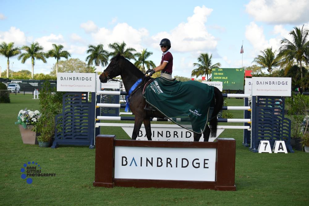 Aaron Vale and Obi Wan claimed the win in the Bainbridge Companies 1.40m Open Stake, with the award presented to his wife, Mallory. ©Anne Gittins Photography