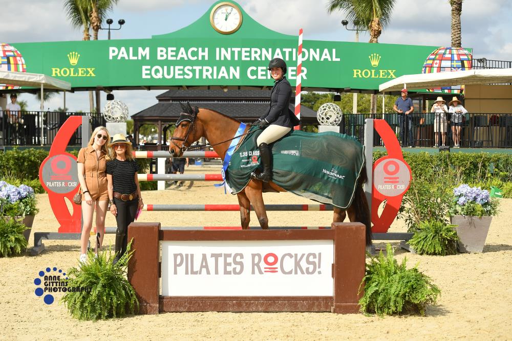 Kristen Berian topped the $5,000 Pilates Rocks 1.35m Jumper Stake with Nestor Z. Pictured with Elissa Salzman, co-owner of Pilates Rocks and her granddaughter, Amanda Glassman. ©Anne Gittins Photography
