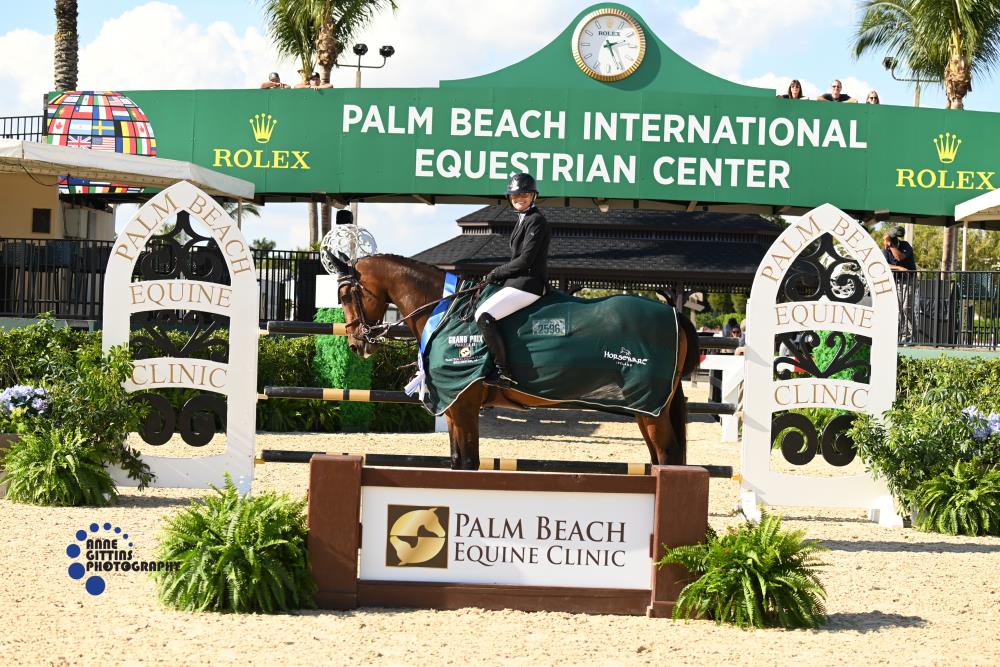 Erynn Ballard and Comedie De Talma galloped to first in the $25,000 Palm Beach Equine Clinic Grand Prix. ©Anne Gittins Photography