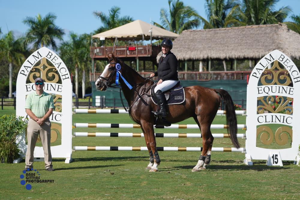 Ana Holguin and Dayro Z, pictured with Dr. Tyler Davis, topped the $2,500 Medium Junior/Amateur Classic presented by Palm Beach Equine Clinic. ©Anne Gittins Photography