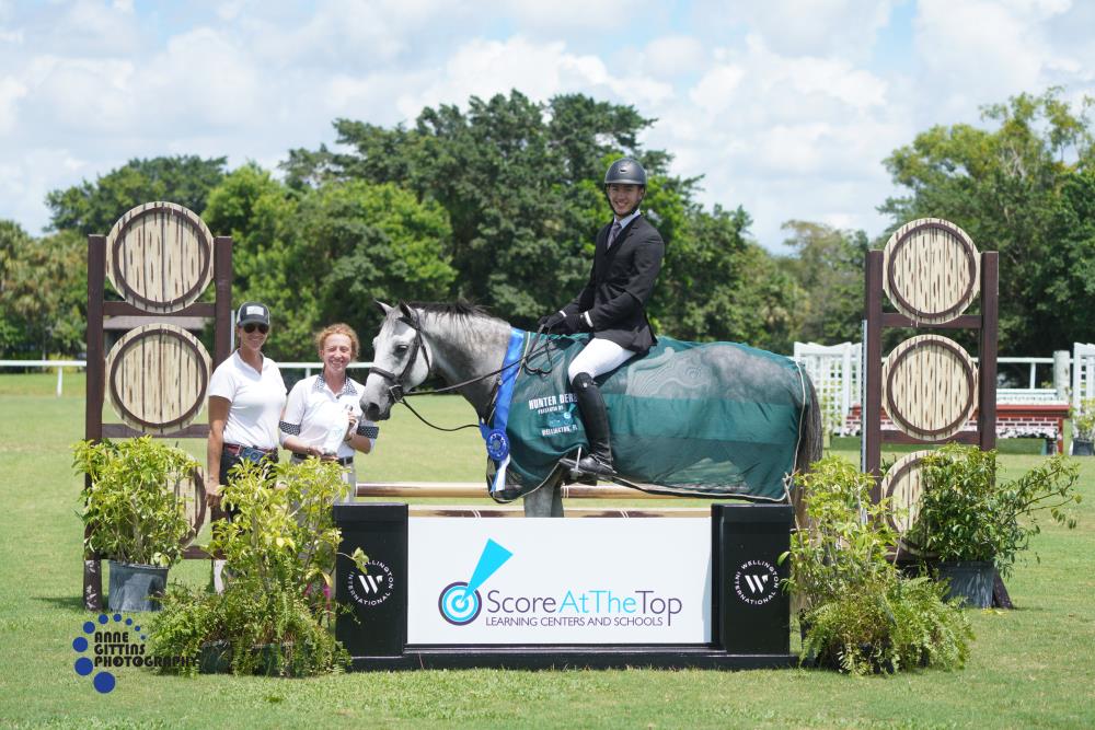 Marcus Cmola Au and Chitty Chitty Bang Bang won the $1,000 2'6"/2'9" Hunter Derby presented by Score At The Top. ©Anne Gittins Photography