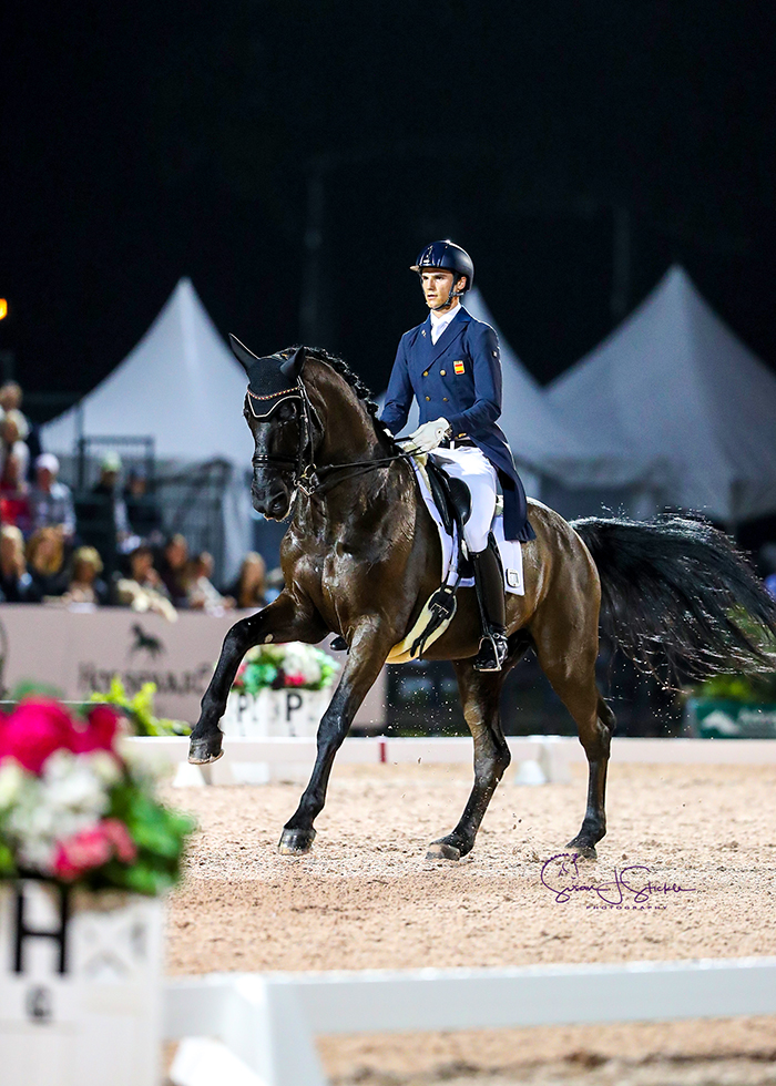 Juan Matute Guimon (ESP) is delighted with his test on Don Diego, which is rewarded with 77.95% and second place. ©️Susan Stickle.