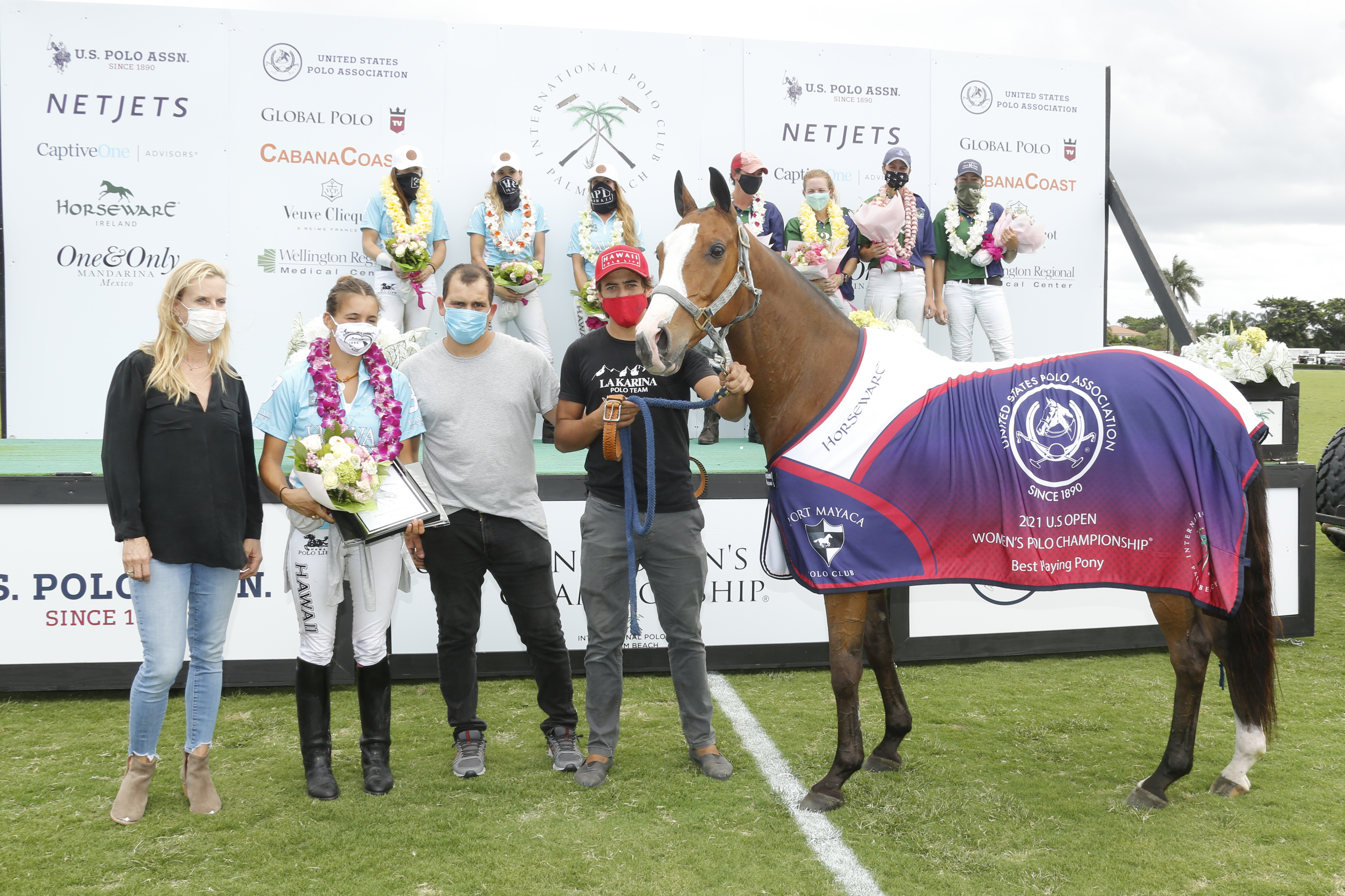 Best Playing Pony El Pico, played by Mia Cambiaso in the third chukker, presented by USPA Governor At Large Cecelia Cochran. Pictured with Andres Luna and Andres Diaz. ©David Lominska